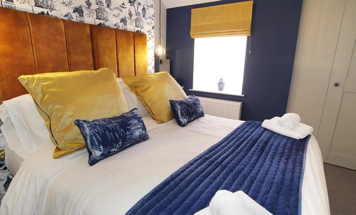 situated on the second floor. King size bed. TV